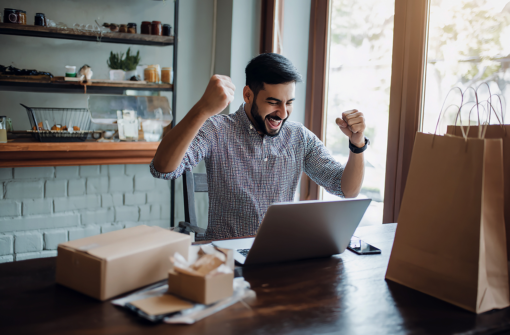 Business owner celebrating success